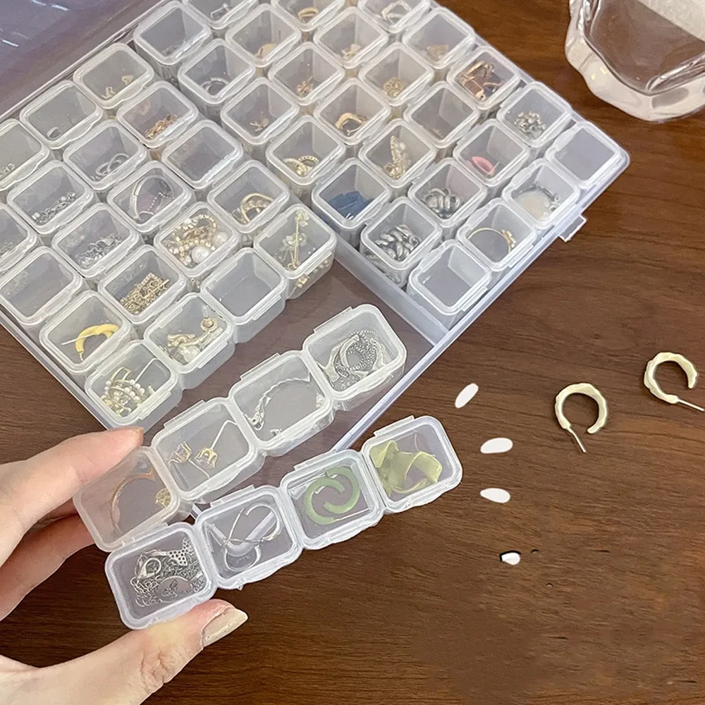 Boîte de rangement plastique à 28 grilles pour bijoux